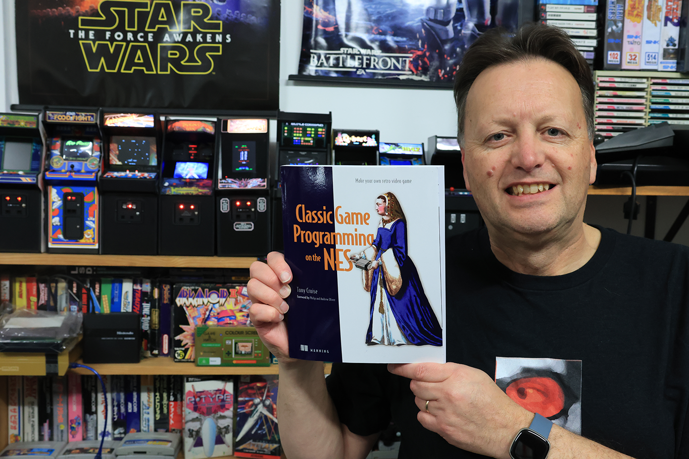 Tony Cruise with a copy of the book